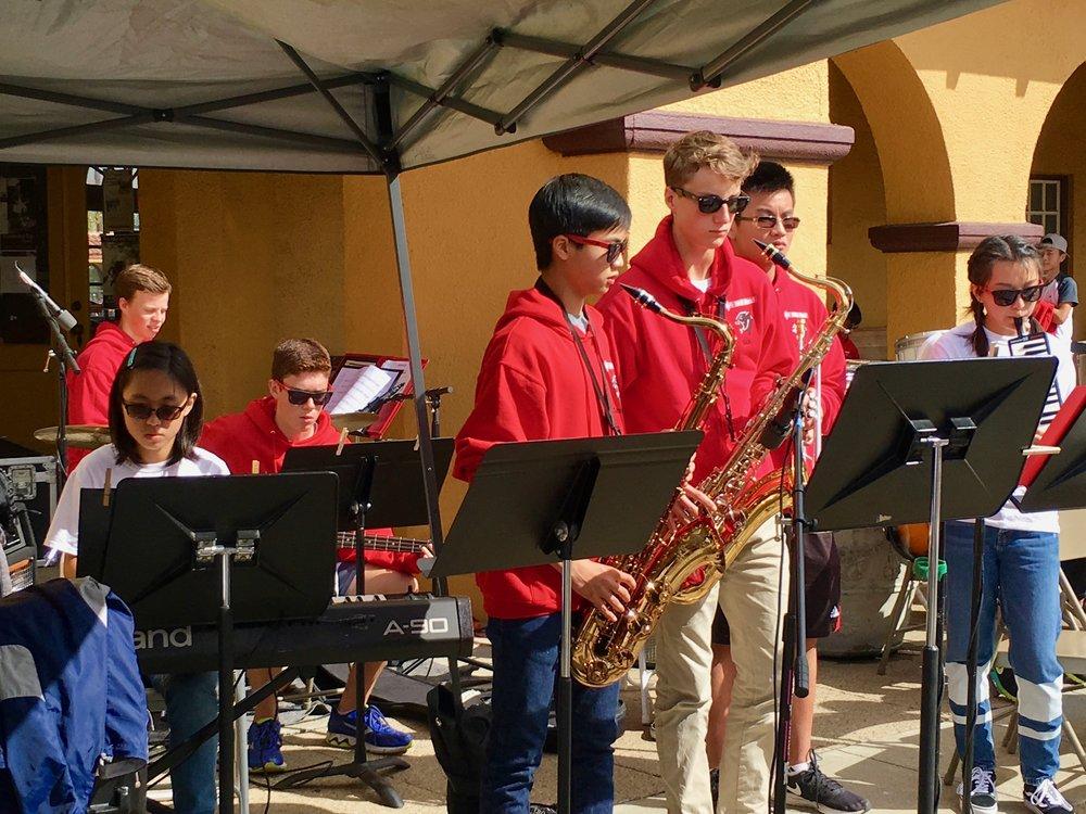  Freshman Justin Hee and James Gordon, and Seniors Kevin Hee and Dara Phung performing at the 27th annual Play-a-thon 