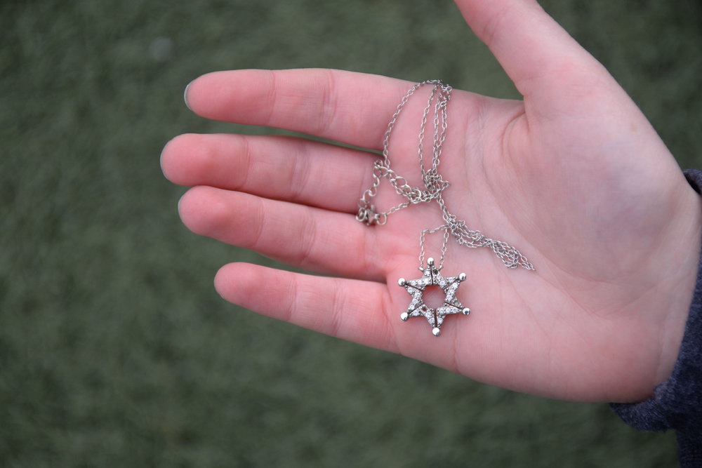  The Star of David is recognized as a symbol of Jewish identity. The design of this necklace, belonging to freshman Zoe Steinberger, has a story. During the Spanish Inquisition, Jews wore Star of David necklaces which could unfold as butterflies in order to conceal their true religious meaning. Steinberger