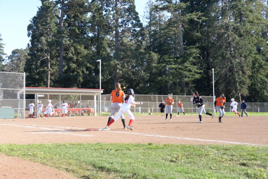 The junior varsity softball team has its first home game
