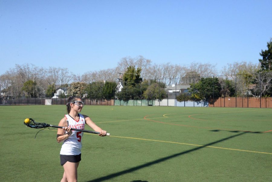 Senior Attacker Izzy Bechwati warms up before gameday