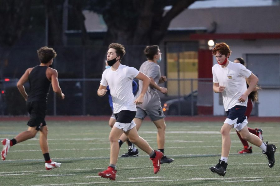 BHS’s junior varsity football team sprints during a conditioning practice on Dec. 2. 