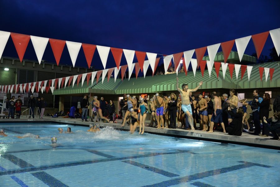 Superintendent+Kevin+Skelly+jumps+into+the+newly+renovated+Burlingame+Aquatic+Center+pool+alongside+students+and+faculty+at+the+opening+ceremony+on+Jan.+8%2C+2020.