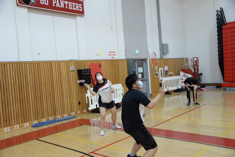 Co-Captain Erika Jiang plays a practice match with Victor Hui on Friday Feb. 25 during morning practice. 