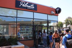 On August 20, a line of customers wait to order at Palmetto Superfoods for their acai bowls and smoothies.