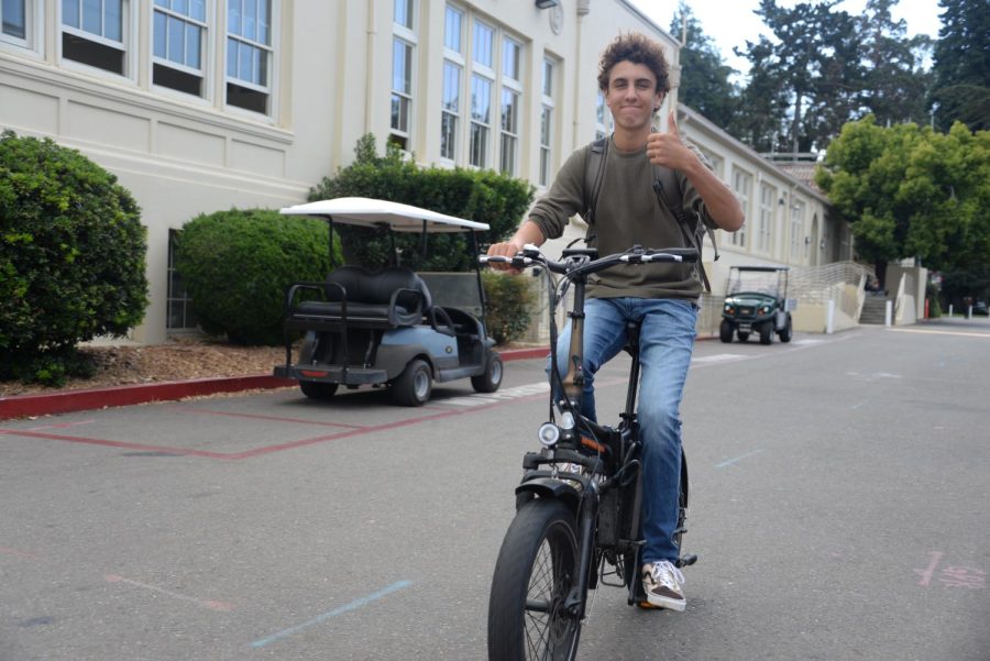 Luke Levitt cruises to the bike rack before school on Wednesday, Sept. 14.