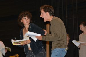 Cast member Lucas Keeley, as Mr. Salzella, rehearses a scene with Clo Papandongas, who plays Agnes Nitt, during a rehearsal for “Maskerade.”