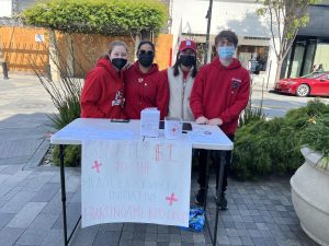 Members from last year’s Red Cross club ran a fundraising stand on Burlingame Avenue.