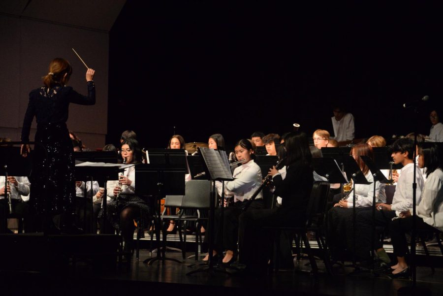 Kyoko Yamamoto leads the Concert Band in a variety of songs, such as “Encanto” and “A Disney Spectacular,” in the Winter Concert on Dec. 7.