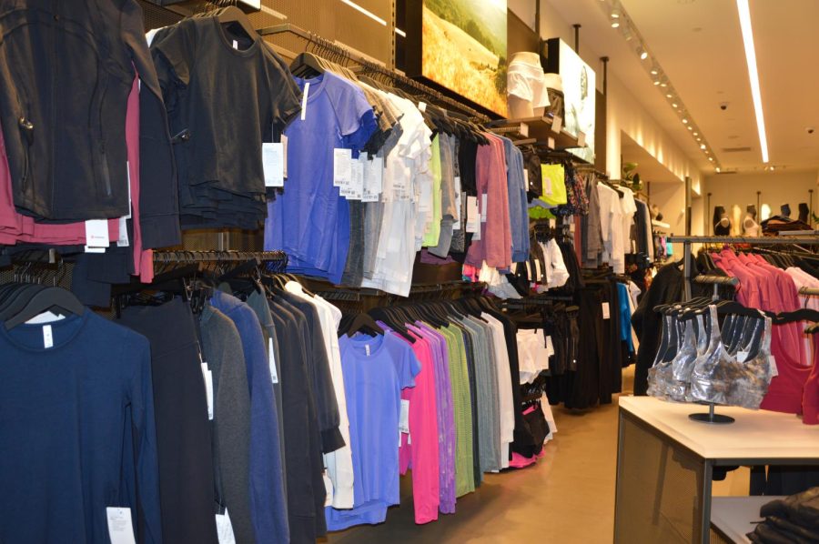 Rows of colorful tops displayed at the Hillsdale Mall’s Lululemon store, a favorite for Burlingame students.