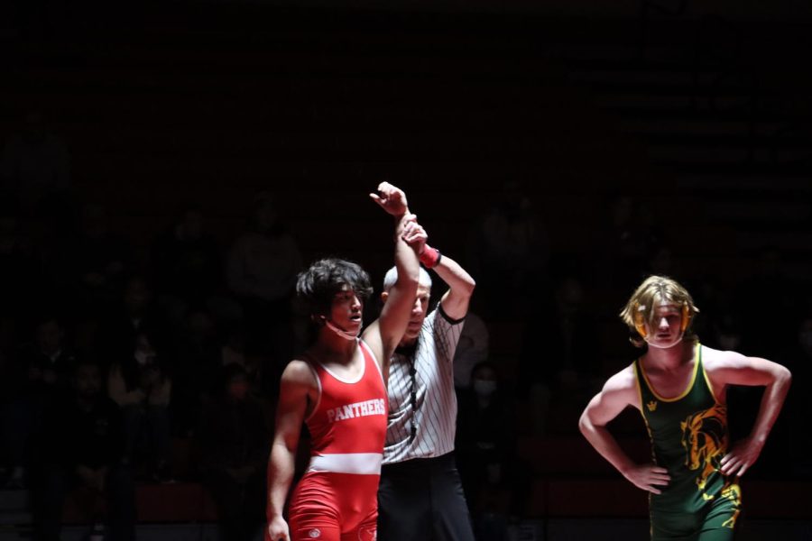 Junior River Lee is victorious against his opponent from Capuchino High School on Thursday,  Jan. 12.