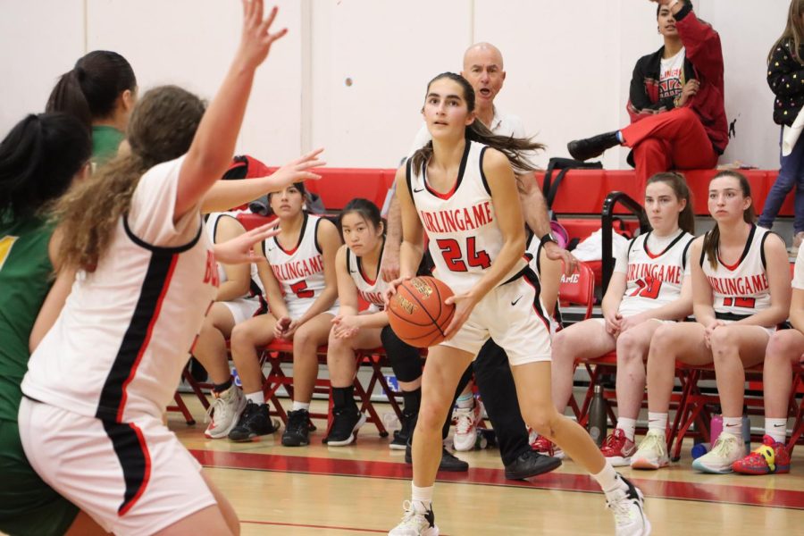 Freshman Haleh Ansari rises to shoot a long two-pointer in the second half of Burlingame’s league matchup against Capuchino. Ansari drained the jumper, and would go on to tally seven points.