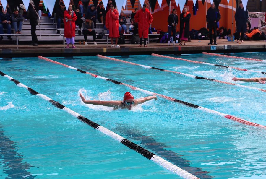 Burlingame swimmers compete in the 100-meter freestyle in a meet against Woodside High School on Friday, April 7.   