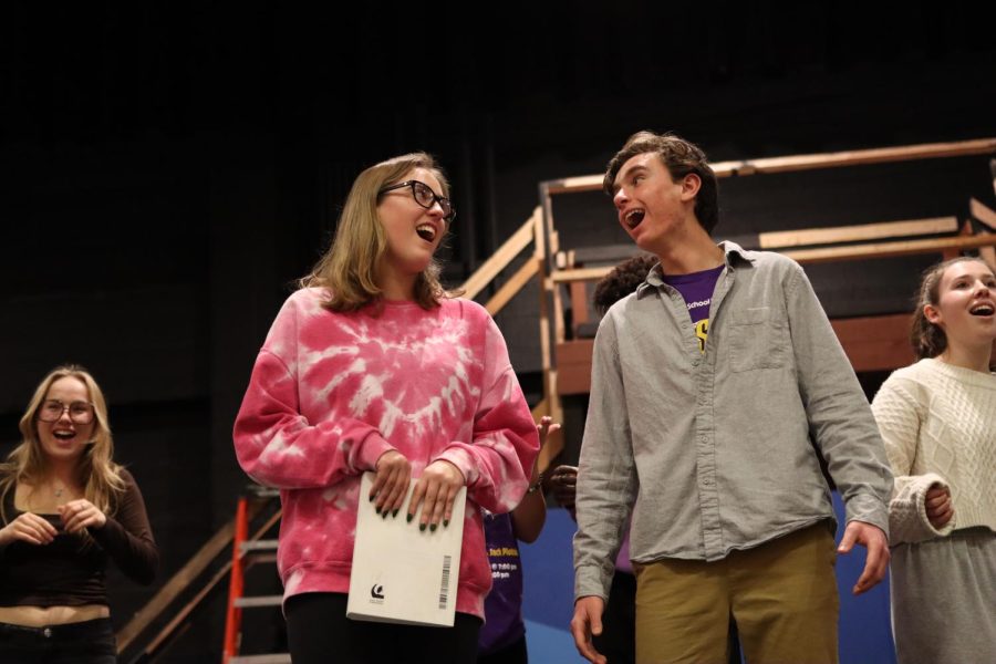 Elizabeth Diehl (Left) and Lukas Keeley (Right) smile affectionately at one another as they sing during one of the final scenes.