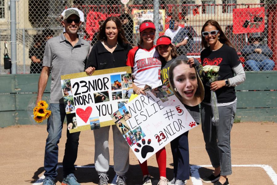 Senior Nora Leslie, the player with the fifth best overall on base percentage, celebrates senior night with her family.