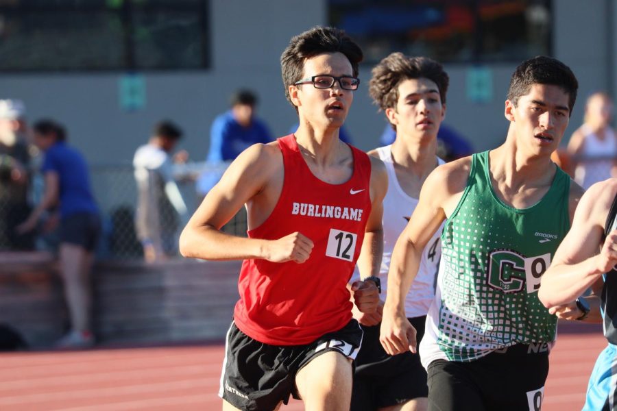 Senior Romer Rosales-Hasek rounds the track in the 800-meter event at CCS Finals.