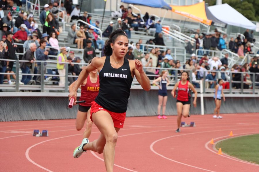 Junior Ava Reichow rounds the track in the 4x400 relay at PAL Finals on May 6. Reichow set the pace for the winning Panther effort in the event. 