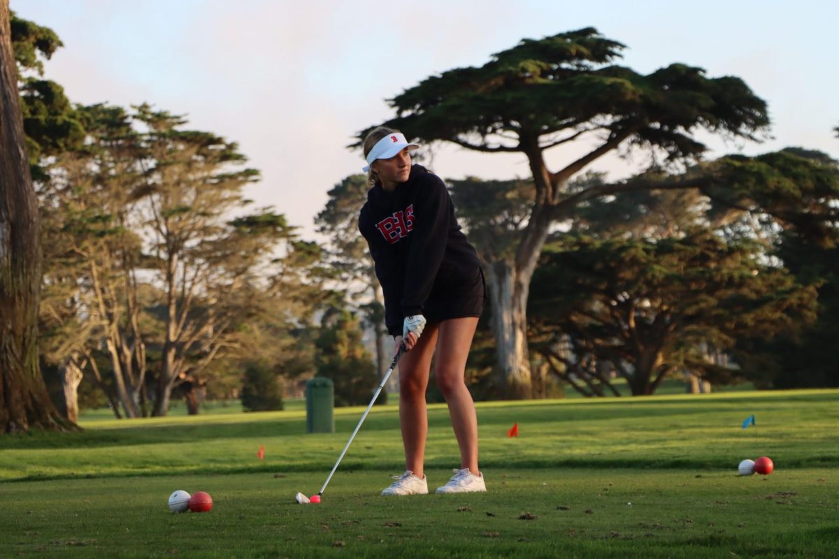 Senior Sarah Ott lines up her shot on the final hole of the Fleming 9 Course in San Francisco on Wednesday, Sept. 6. 