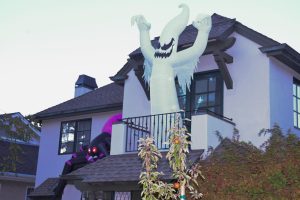On Cabrillo Avenue, blow-up characters are the most common form of decoration, ranging from ghosts and dinosaurs to cats and spiders.
