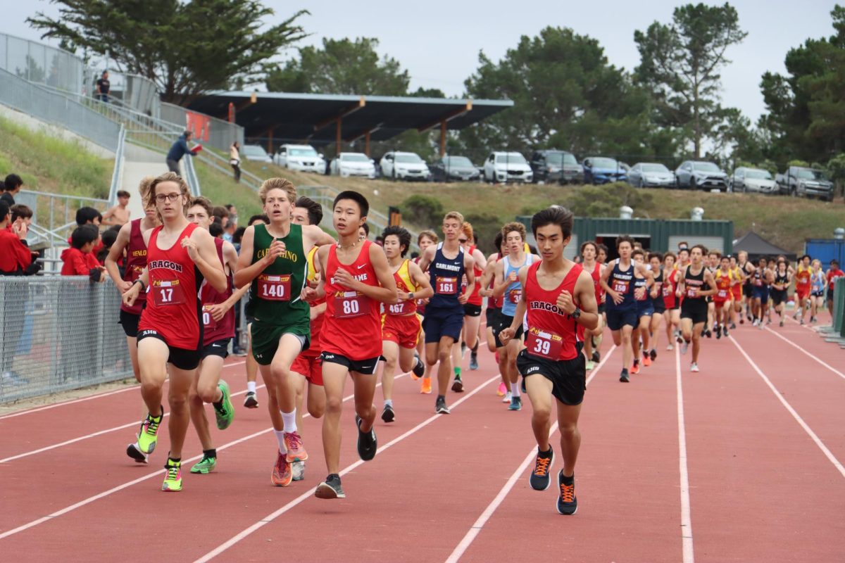 Sophomore Ryan Liu leads a group of runners during the boys’ frosh-soph race. He ended the race in eighth place.