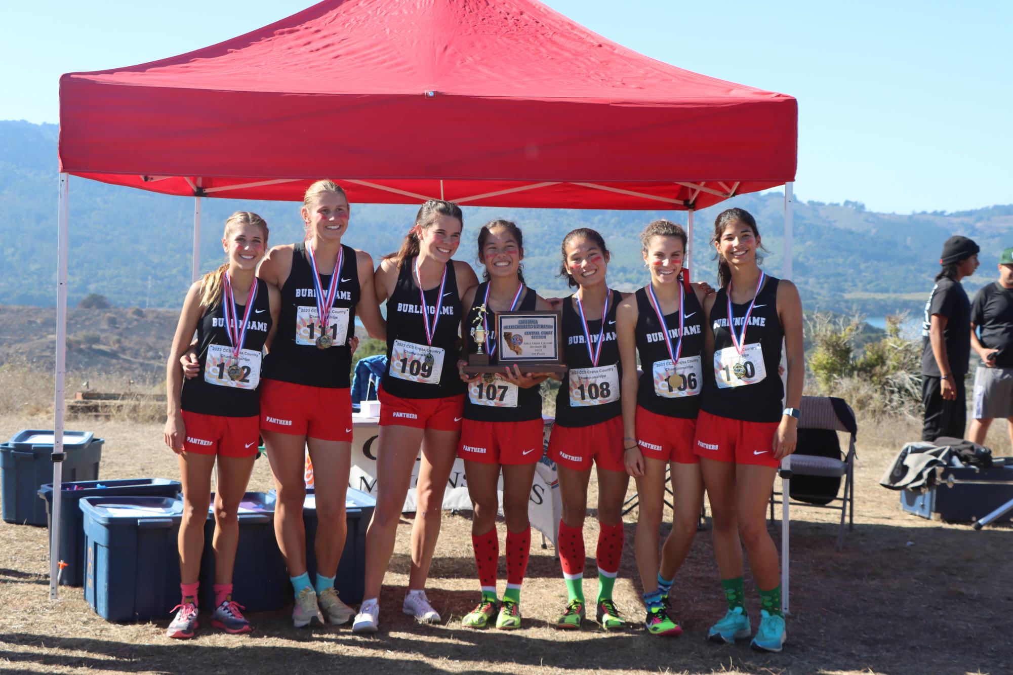 Girls’ varsity receives their awards, celebrating the first CCS championship in Burlingame cross country history. 
