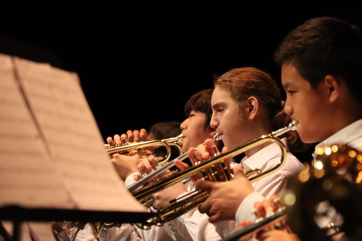 Trumpeters play their hearts out as they follow the conducting of Yamamoto through their set. 