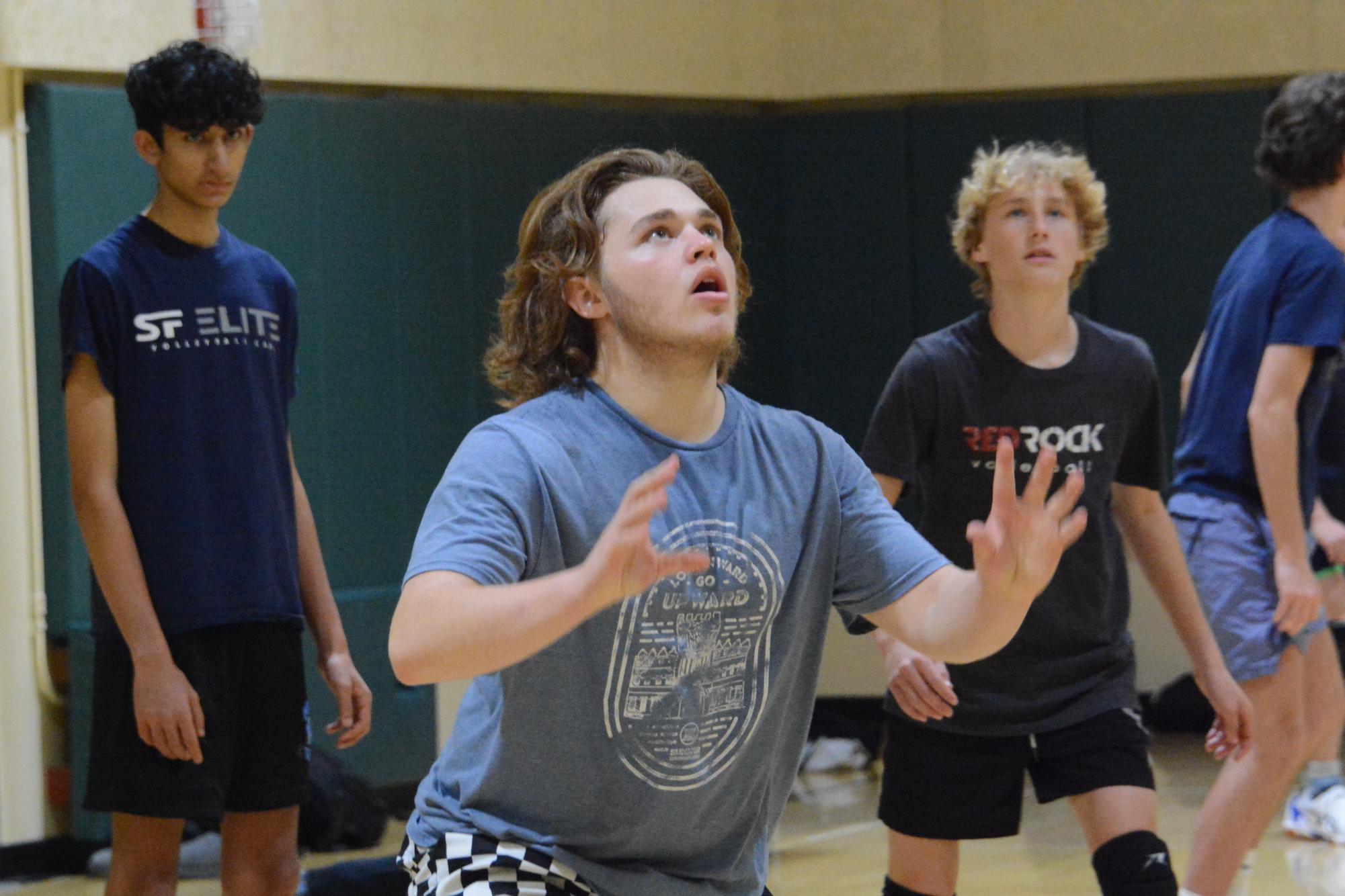 Senior Ellis McConnell looks up to set the ball during boys’ volleyball’s second week of practice at Capuchino High School on Feb. 28.
