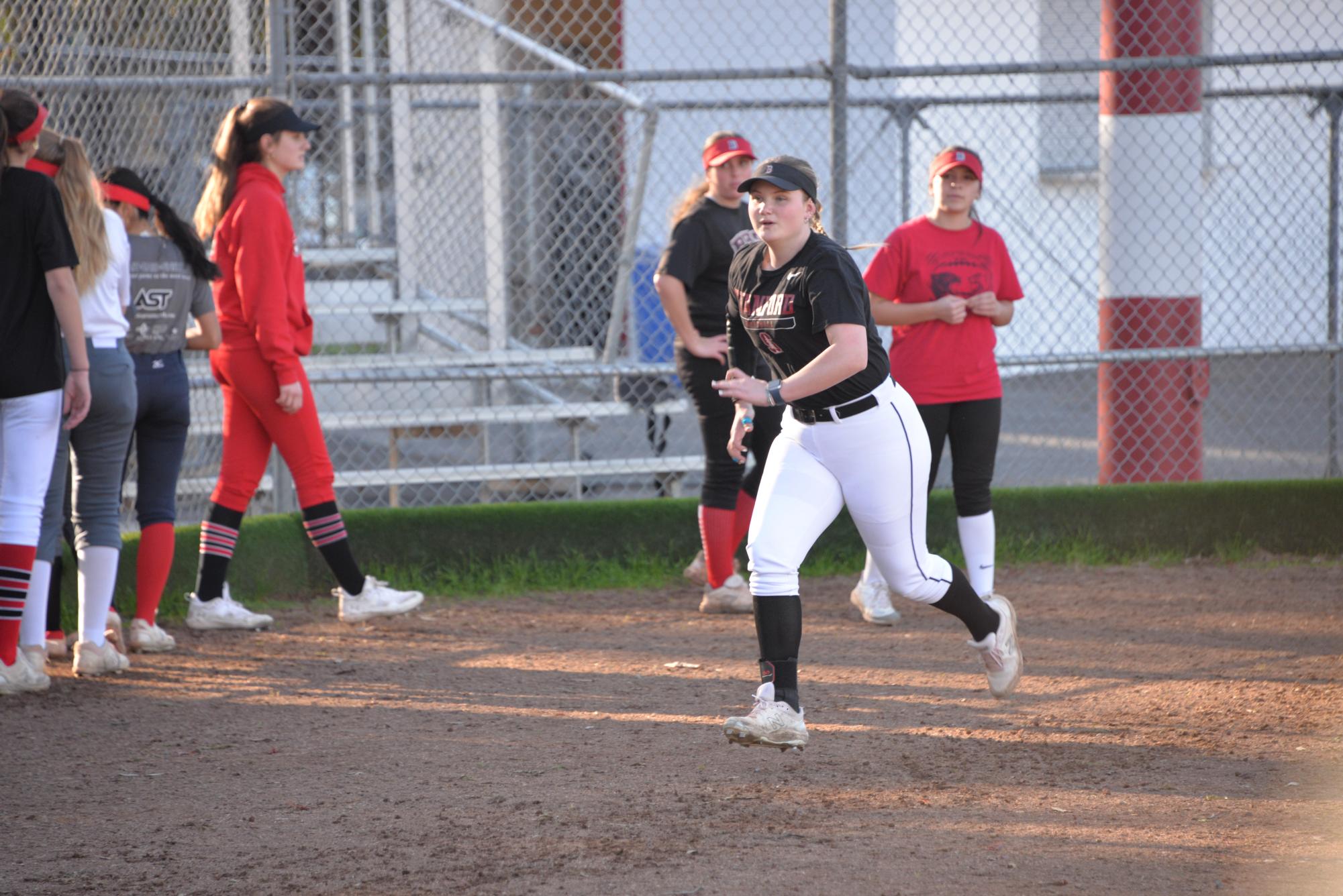Senior Shayna Young runs the bases during practices with her team on Wednesday, Feb. 28.