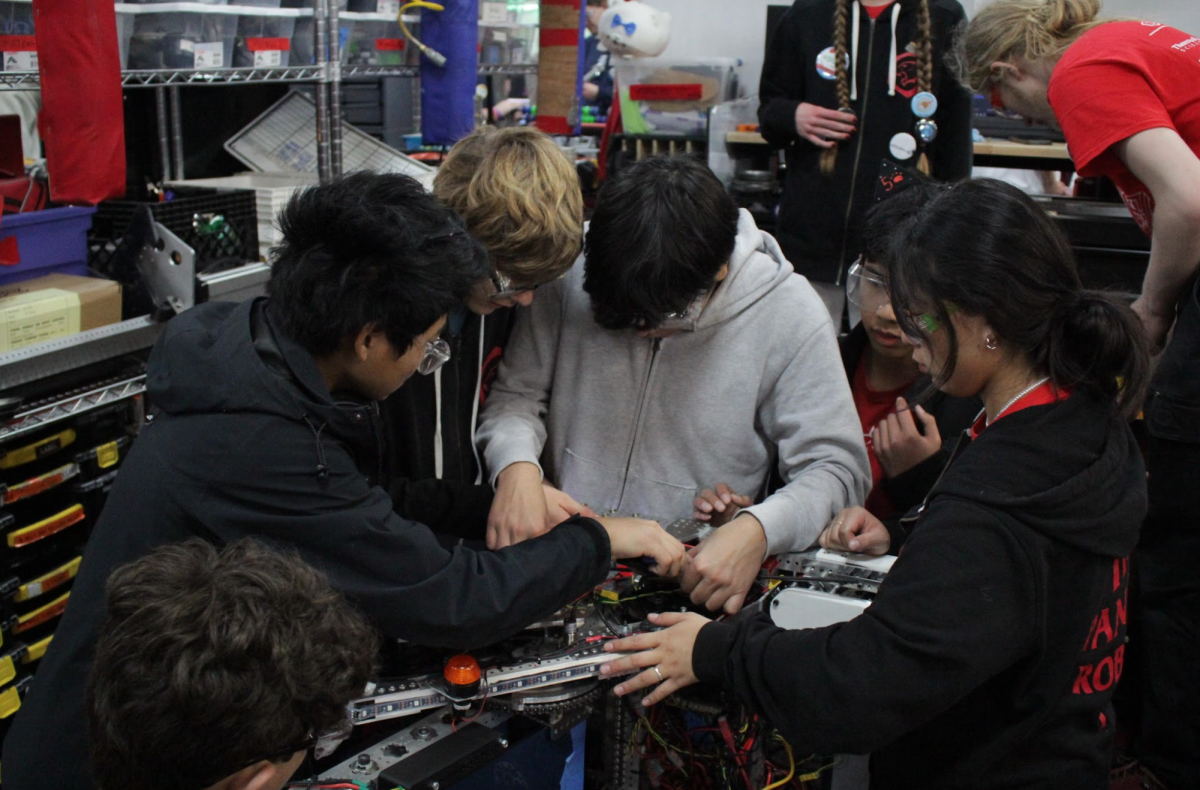 On Sunday March 3, Iron Panthers collaborated to fix their robot which broke right before quarterfinals. 

