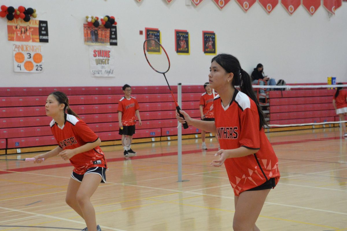 Juniors Gabby Vega and KayKay Pan get in position to receive a serve. 