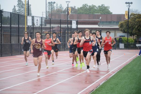 Seniors Jake Ramirez and Zachery Zloblinsky keep up their speed against tough competition in the boys’ 800-meter race.