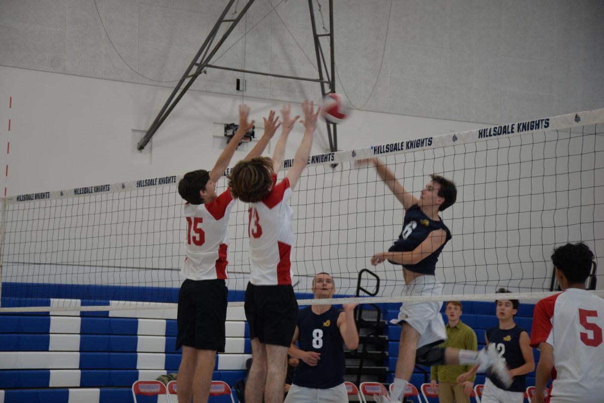 Sophomore Fabian Falconett (left) and junior C. J. Reed (right) block an attack from Soquel High School during their first match in the Central Coast Section (CCS) tournament. 