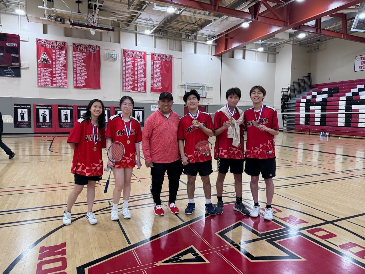 (Left to right:) Senior Clara Zhong, junior Ashley Zeng, head coach Sal Banquiles, sophomore Brandon Mark, freshman Brandon Lin and senior Captain Jayden Ma pose for a photo after qualifying for CCS and placing in the top four at PALs. 