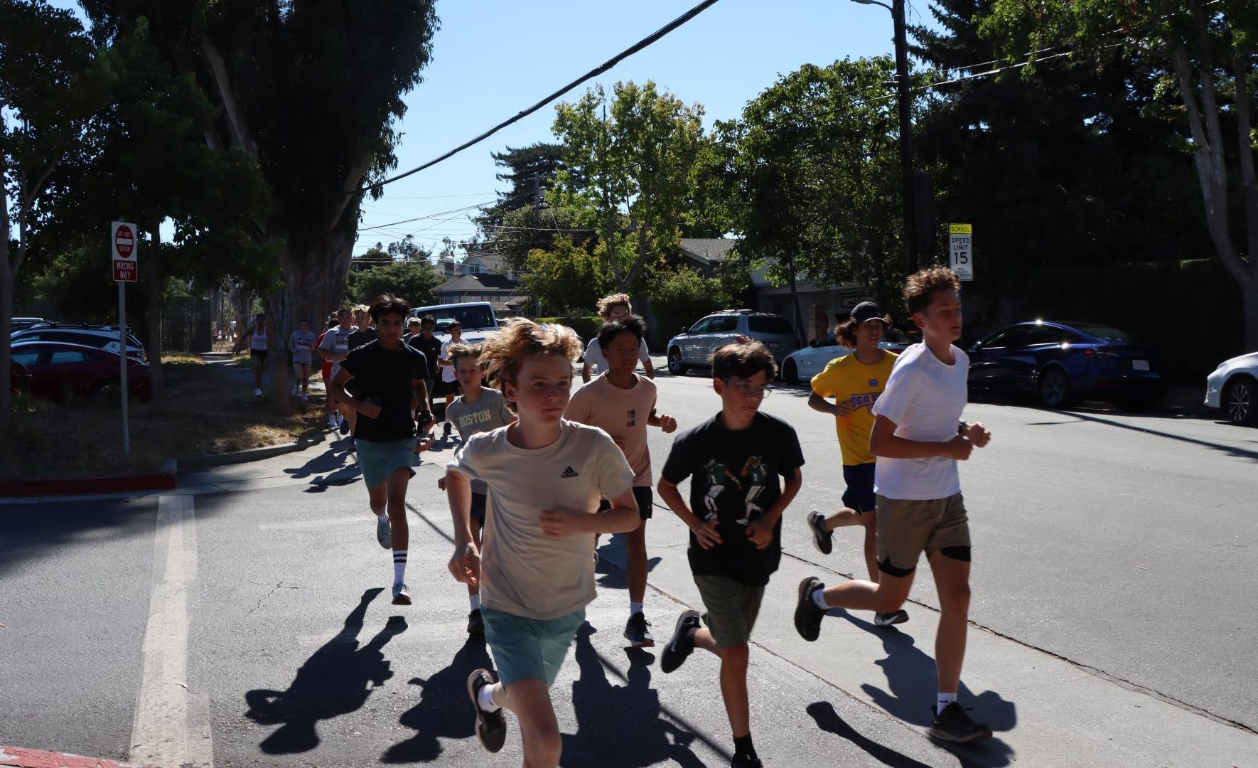 The squad takes a lap around the school as a part of their practice regimen.