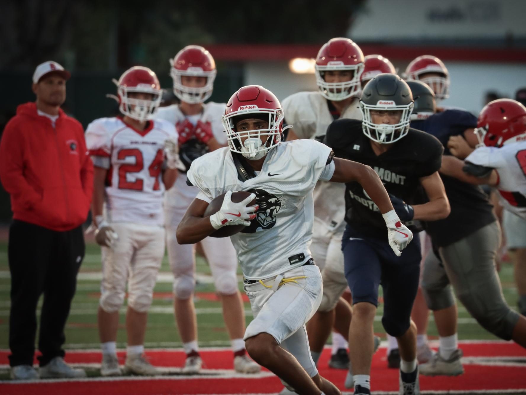 Sophomore running back Qasim Abutair breaks free for a first down during Burlingame’s pre-season scrimmage against Carlmont.