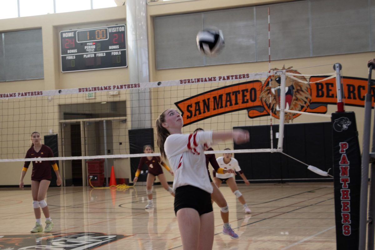 Senior Jillian Kiniris returns the ball during girls’ volleyball’s tight victory against Menlo Atherton on Tuesday, Sept. 24th.