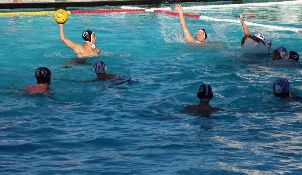 Junior Adrian Gong prepares for a shot against Aragon.