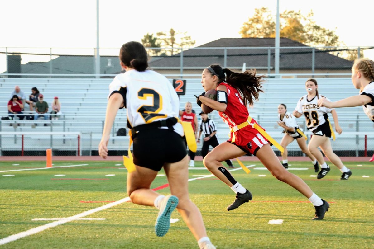 Freshman Miya Steinbach — who was pulled up from the junior varsity team to play against Terra Nova — dashes for the endzone after intercepting the ball during the first quarter of a game on Wednesday, Oct. 3rd. Steinbach proceeded to score a pick six, increasing the Panthers’ lead to 28.