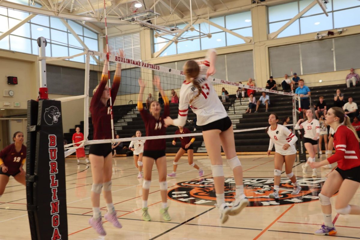 Freshman Ilsa Carlson playing in a match against Menlo Atherton High School on Tuesday, Sept. 4.