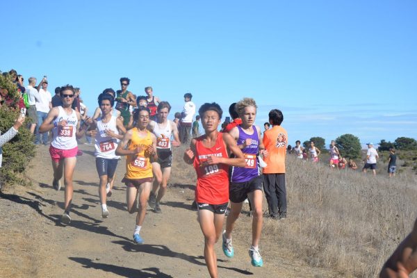 Junior Ryan Liu leads the pack during the last leg of the race. 