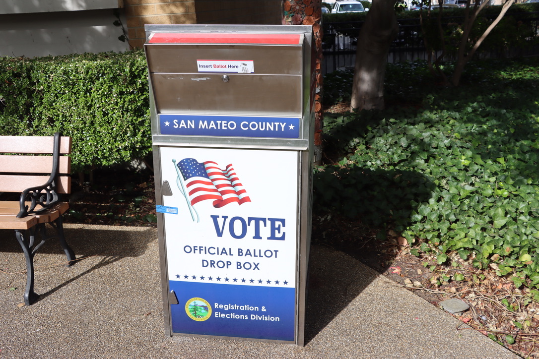 Students work at polling stations on election day