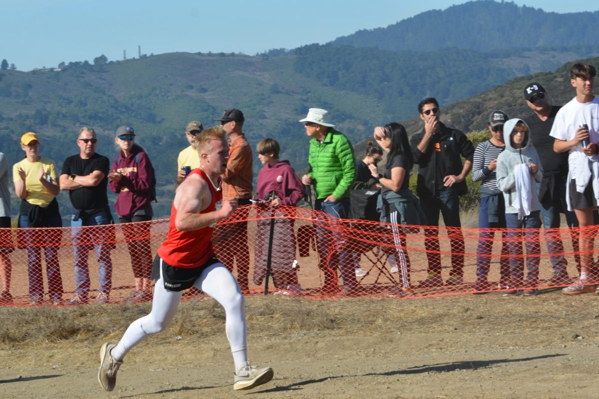 Senior Christian Kleinekorte sprints to the finish line in his final race of the season. 