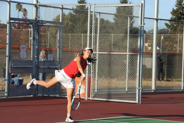 Junior Samantha Tom plays doubles with junior Evelyn Du in the PAL Individuals Tournament. 