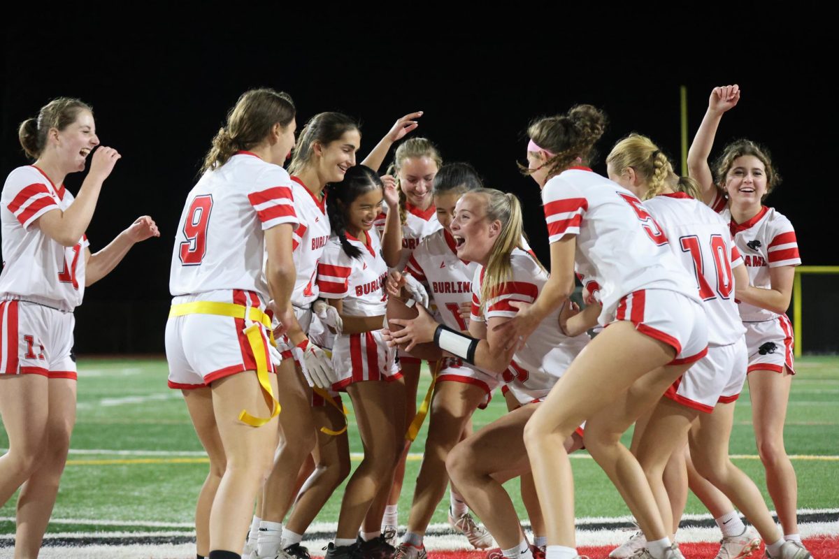 Elated, the team members celebrate their 30-0 victory over Aragon during their game on Wednesday, Oct. 30.