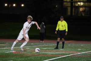 Senior Kylan Dean attempts a penalty kick in the closing moments of the Panthers’ game against Hillsdale. 