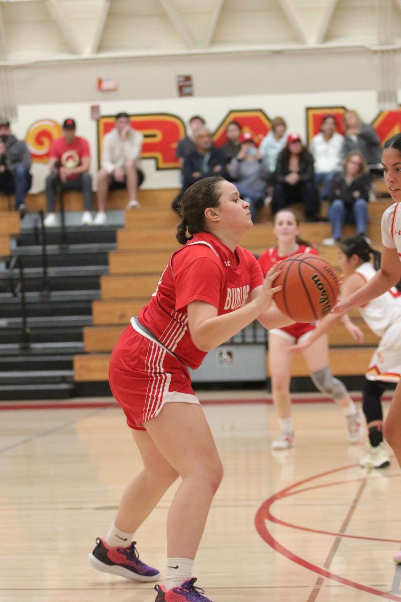 Senior and co-captain Siena La Mark gathers the ball to shoot a three against Willow Glen’s formidable defense. 