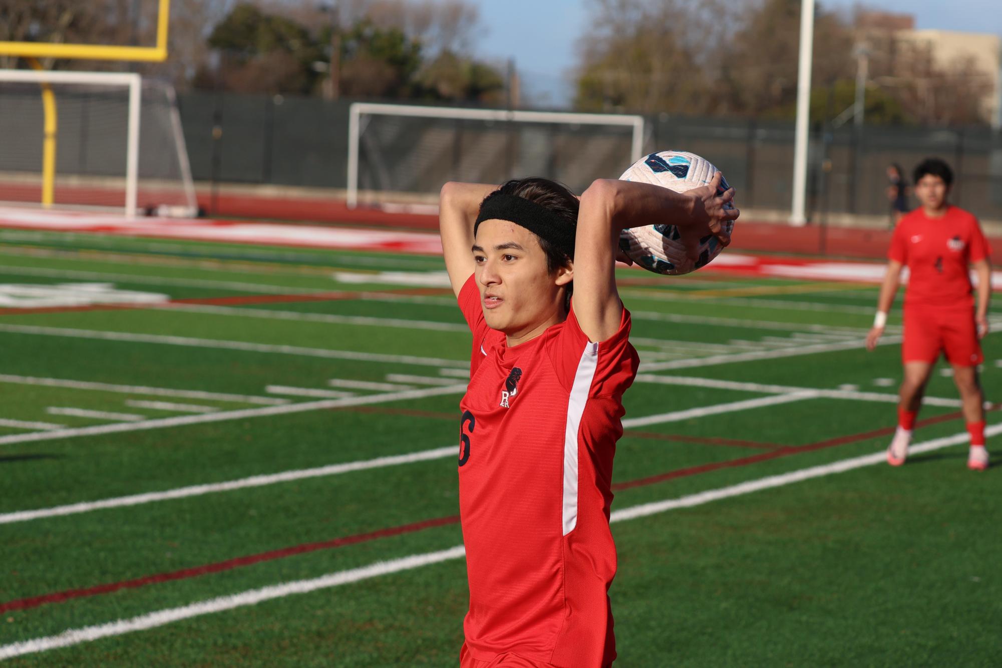 Last-minute heroics fuel boys’ soccer playoff berth