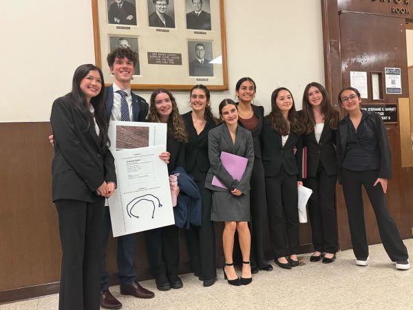 Burlingame mock trial poses after qualifying for the semi-finals where they faced the strongest team in the region from Menlo.