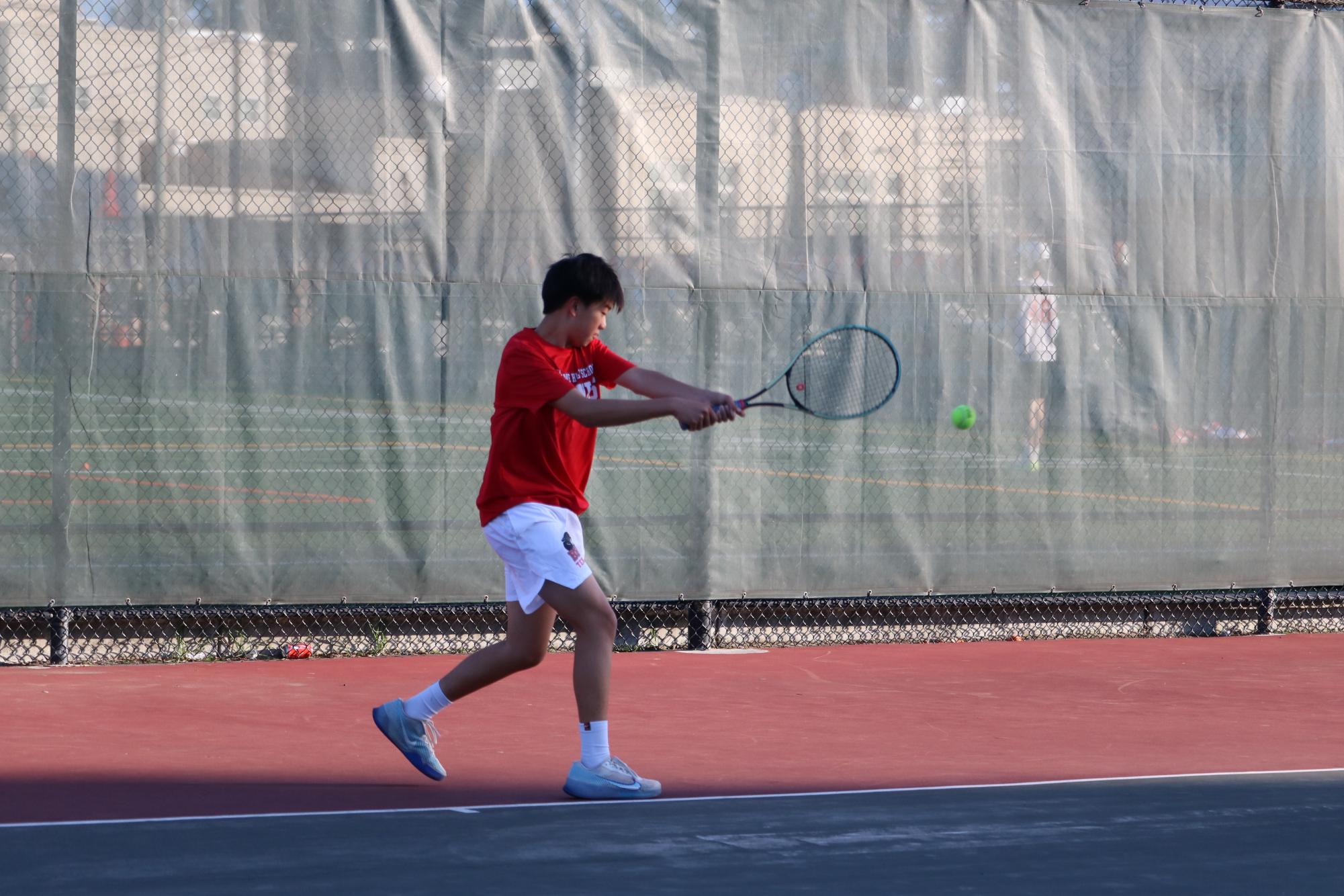 ‘We’re all like a little family’: Boys’ tennis attributes statement victory against Hillsdale to unshakable  bond