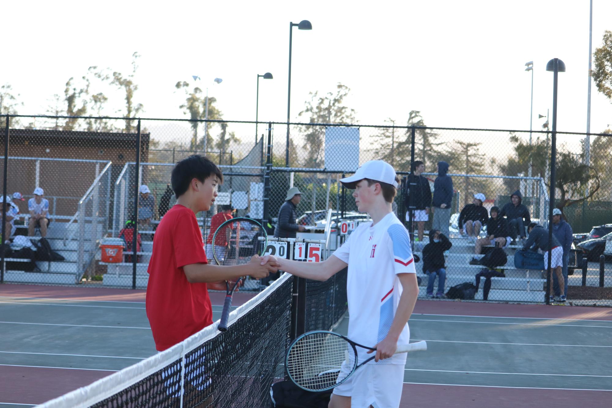 ‘We’re all like a little family’: Boys’ tennis attributes statement victory against Hillsdale to unshakable  bond