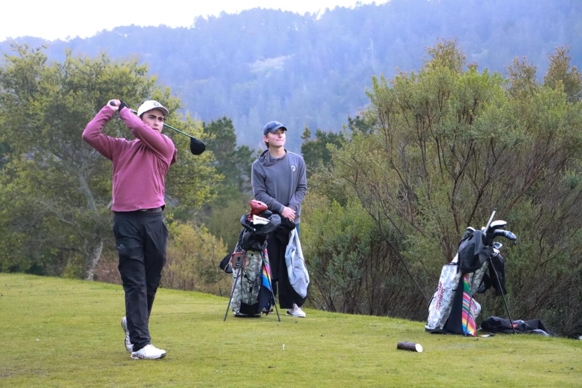 Junior Cole Weyer watches his drive on the seventh hole at Crystal Springs Golf Course on Monday, March 18 against Carlmont. 